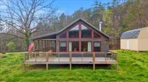 Cabin with 13 acres of lawn, trees and trails